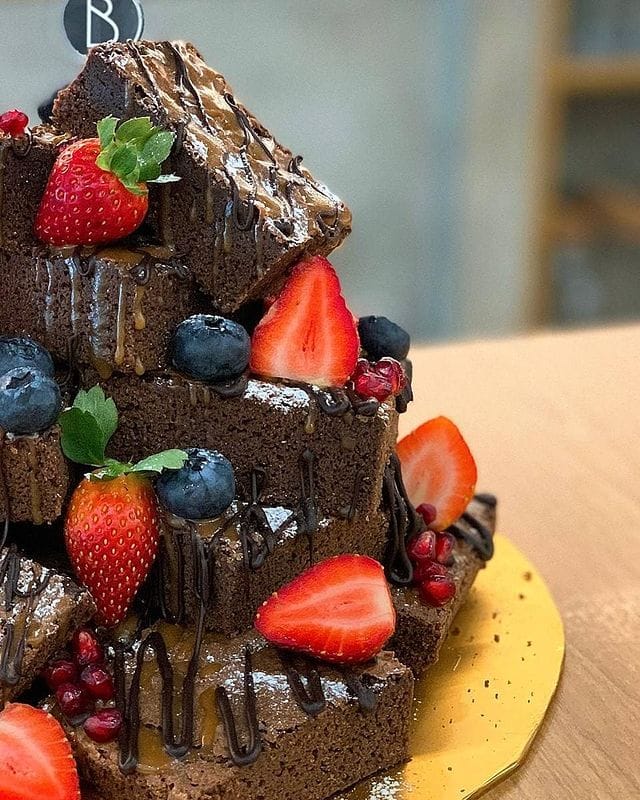 tower of brownies with fresh berries